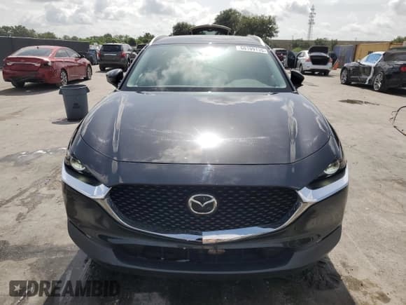 ✅ 2023 Mazda CX-30 S Carbon Edition • VIN: 3MVDMBCM2PM572015 • Lot: 60109135. Listed on Copart with 27,790 mi. Free auction sales archive from the USA and detailed vehicle history report at DreamBid. Image 5.