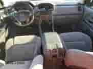 2004 Honda Pilot LX with VIN 2HKYF18104H543202, listed as a Copart auction lot 69050395 with 205,083 mi miles and Salvage title. Bid and sale history available at DreamBid. Image 8.