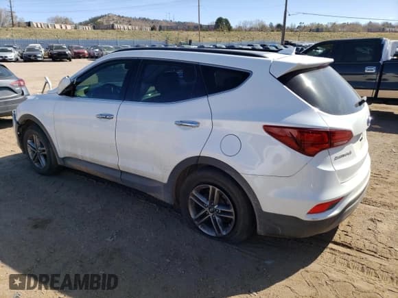 ✅ 2017 Hyundai Santa Fe 2.4L • VIN: 5XYZU3LB6HG457332 • Лот: 50160334. Опубликован ранее на Copart с пробегом 112 928 миль. Бесплатный доступ к архиву аукционных продаж из США и подробный отчёт об истории автомобиля на DreamBid. Изображение 2.