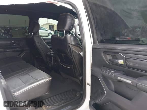 2023 Ram 1500 Limited with VIN 1C6SRFHT5PN576378, listed as a IAAI auction lot 42253096 with 41,802 mi miles and . Bid and sale history available at DreamBid. Image 8.