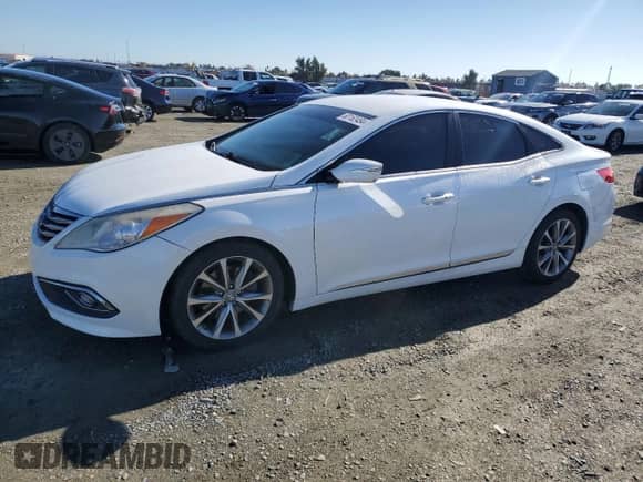 2015 Hyundai Azera z VIN KMHFG4JG1FA472859, wystawiony jako Copart lot #80162484 z przebiegiem 187 344 mil mil oraz Czysty tytuł • Clean title. Historia ofert i sprzedaży dostępna na DreamBid. Obrazek 1.