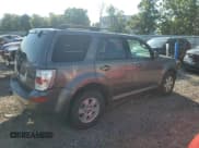 ✅ 2010 Mercury Mariner • VIN: 4M2CN9BG0AKJ07403 • Lot: 80071025. Listed on Copart with 128,074 mi. Free auction sales archive from the USA and detailed vehicle history report at DreamBid. Image 3.