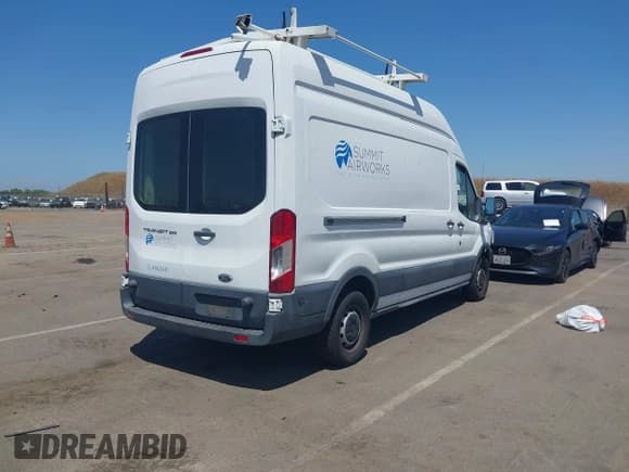 ✅ 2015 Ford Transit Cargo • VIN: 1FTNR2XM9FKA18848 • Lot: 42218203. Listed on IAAI with 162,184 mi. Free auction sales archive from the USA and detailed vehicle history report at DreamBid. Image 4.