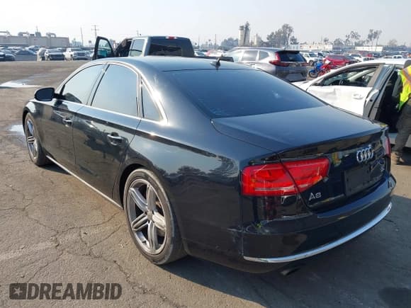 ✅ 2011 Audi A8 • VIN: WAUAVAFD6BN023937 • Lot: 41288464. Listed on IAAI with 158,127 mi. Free auction sales archive from the USA and detailed vehicle history report at DreamBid. Image 3.