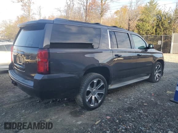 ✅ 2015 Chevrolet Suburban LT • VIN: 1GNSKJKC7FR195218 • Lot: 92090005. Listed on Copart with 257,730 mi. Free auction sales archive from the USA and detailed vehicle history report at DreamBid. Image 3.