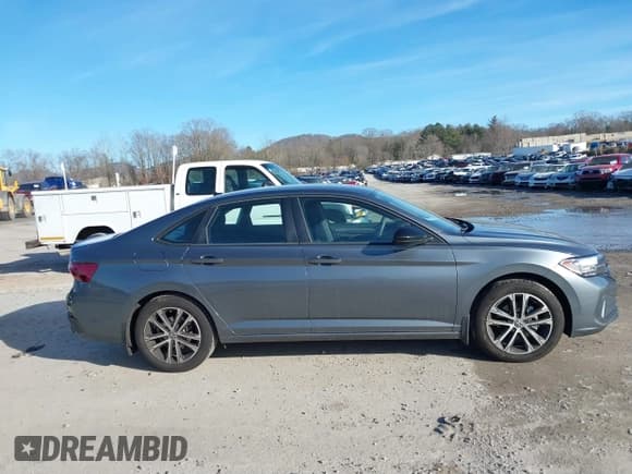 ✅ 2022 Volkswagen Jetta Sport • VIN: 3VWBM7BU1NM023357 • Lot: 38647076. Listed on IAAI with 7,596 mi. Free auction sales archive from the USA and detailed vehicle history report at DreamBid. Image 13.