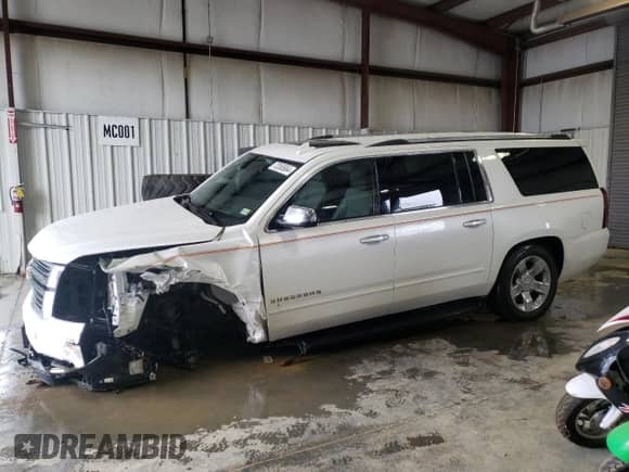 2020 Chevrolet Suburban Premier z VIN 1GNSKJKC5LR174248, wystawiony jako Copart lot #73365664 z przebiegiem 124 755 mil mil oraz Szkoda całkowita • Salvage title. Historia ofert i sprzedaży dostępna na DreamBid. Obrazek 1.