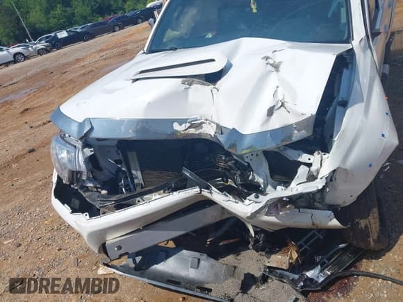 ✅ 2015 Toyota Tacoma PreRunner • VIN: 5TFKU4HN3FX007156 • Lot: 42460345. Listed on IAAI with 123,563 mi. Free auction sales archive from the USA and detailed vehicle history report at DreamBid. Image 12.