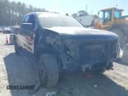 ✅ 2020 Chevrolet Silverado 1500 Custom Trail Boss • VIN: 1GCRYCEFXLZ132648 • Lot: 41683794. Listed on IAAI with 111,782 mi. Free auction sales archive from the USA and detailed vehicle history report at DreamBid. Image 13.