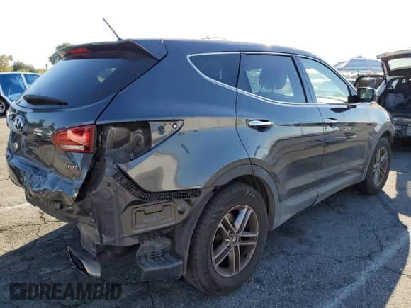 2018 Hyundai Santa Fe 2.4L with VIN 5XYZT3LB2JG509984, listed as a Copart auction lot 85510595 with 103,988 mi miles and Salvage title. Bid and sale history available at DreamBid. Image 3.