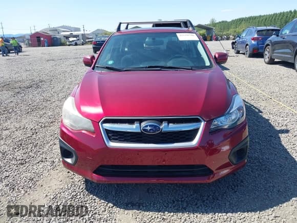 ✅ 2012 Subaru Impreza Premium • VIN: JF1GPAD62CH210772 • Lot: 42539790. Listed on IAAI with 102,298 mi. Free auction sales archive from the USA and detailed vehicle history report at DreamBid. Image 12.