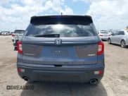 ✅ 2021 Honda Passport EX-L • VIN: 5FNYF8H52MB024467 • Lot: 42427539. Listed on IAAI with 75,652 mi. Free auction sales archive from the USA and detailed vehicle history report at DreamBid. Image 16.