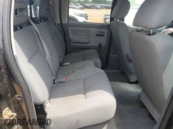 2005 Dodge Dakota ST with VIN 1D7HE28K35S304477, listed as a Copart auction lot 59599385 with 127,683 mi miles and Salvage title. Bid and sale history available at DreamBid. Image 10.