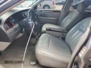 ✅ 2003 Lincoln Town Car Executive • VIN: 1LNHM81WX3Y610367 • Lot: 68898224. Listed on Copart with 152,216 mi. Free auction sales archive from the USA and detailed vehicle history report at DreamBid. Image 7.