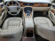 ✅ 1999 Jaguar XJ • VIN: SAJHX1040XC864208 • Лот: 59748585. Опубликован ранее на Copart с пробегом 130 577 миль. Бесплатный доступ к архиву аукционных продаж из США и подробный отчёт об истории автомобиля на DreamBid. Изображение 8.