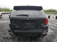 ✅ 2023 Honda Passport EX-L • VIN: 5FNYF8H55PB022183 • Lot: 57305445. Listed on Copart with 31,296 mi. Free auction sales archive from the USA and detailed vehicle history report at DreamBid. Image 6.