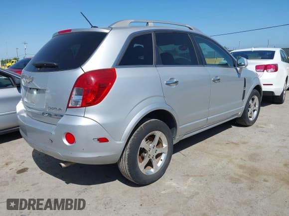 ✅ 2013 Chevrolet Captiva Sport LT • VIN: 3GNAL3EK5DS637043 • Lot: 42089008. Wystawiony na IAAI z przebiegiem 170 556 mil. Bezpłatny archiwum sprzedaży aukcyjnych z USA i szczegółowy raport historii pojazdu na DreamBid. Zdjęcie 4.