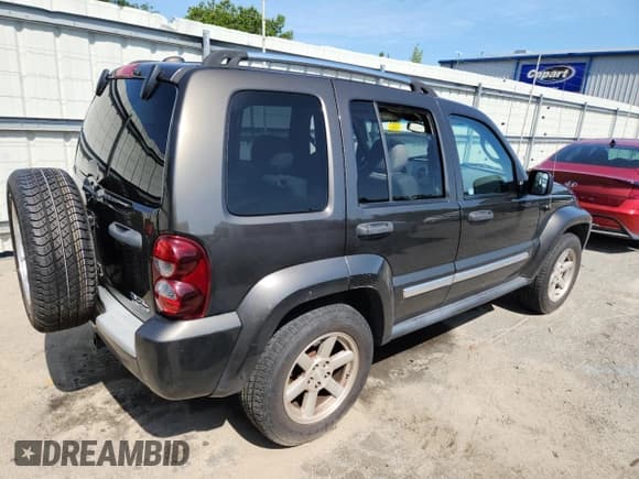 ✅ 2005 Jeep Liberty Limited • VIN: 1J4GK58K05W576973 • Lot: 63295915. Listed on Copart with 124,726 mi. Free auction sales archive from the USA and detailed vehicle history report at DreamBid. Image 3.