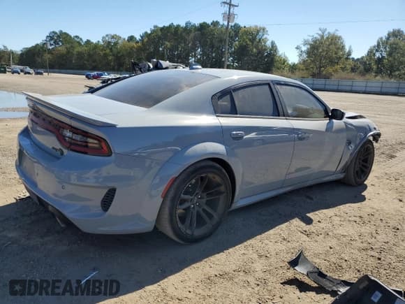 ✅ 2022 Dodge Charger SRT Hellcat Widebody • VIN: 2C3CDXL98NH210518 • Лот: 82744645. Опубликован ранее на Copart с пробегом 30 521 миль. Бесплатный доступ к архиву аукционных продаж из США и подробный отчёт об истории автомобиля на DreamBid. Изображение 3.