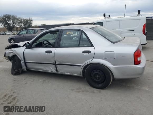 ✅ 2001 Mazda Protege DX • VIN: JM1BJ222310425181 • Lot: 88560255. Wystawiony na Copart z przebiegiem 201 942 mil. Bezpłatny archiwum sprzedaży aukcyjnych z USA i szczegółowy raport historii pojazdu na DreamBid. Zdjęcie 2.
