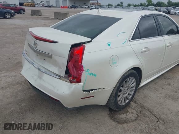 ✅ 2012 Cadillac CTS Luxury • VIN: 1G6DE5E55C0110439 • Lot: 42525930. Listed on IAAI with 140,328 mi. Free auction sales archive from the USA and detailed vehicle history report at DreamBid. Image 12.