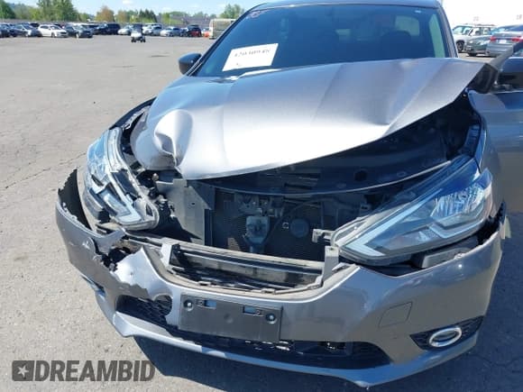 ✅ 2018 Nissan Sentra S • VIN: 3N1AB7AP9JY310922 • Лот: 42030948. Опубликован ранее на IAAI с пробегом 96 763 миль. Бесплатный доступ к архиву аукционных продаж из США и подробный отчёт об истории автомобиля на DreamBid. Изображение 6.