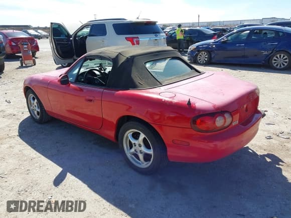 ✅ 2001 Mazda MX-5 Miata • VIN: JM1NB353910201434 • Lot: 41817576. Listed on IAAI with 209,104 mi. Free auction sales archive from the USA and detailed vehicle history report at DreamBid. Image 3.