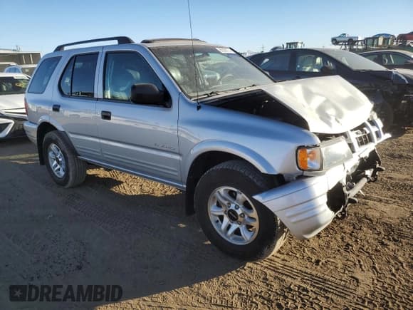 ✅ 2003 Isuzu Rodeo • VIN: 4S2DM58W734305363 • Lot: 85539774. Listed on Copart with 219,300 mi. Free auction sales archive from the USA and detailed vehicle history report at DreamBid. Image 4.