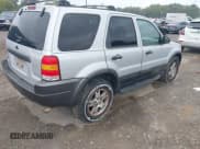 ✅ 2004 Ford Escape XLT • VIN: 1FMCU93154KB37497 • Lot: 43228445. Listed on IAAI with 145,512 mi. Free auction sales archive from the USA and detailed vehicle history report at DreamBid. Image 4.