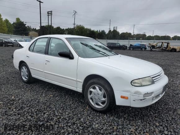 ✅ 1997 Nissan Altima XE • VIN: 1N4BU31D2VC235401 • Lot: 74559934. Listed on Copart with 122,653 mi. Free auction sales archive from the USA and detailed vehicle history report at DreamBid. Image 4.