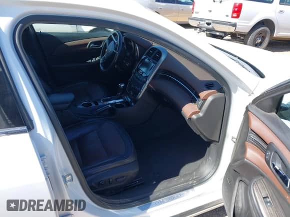 2014 Chevrolet Malibu LTZ with VIN 1G11H5SL6EF294731, listed as a IAAI auction lot 43455733 with 145,159 mi miles and . Bid and sale history available at DreamBid. Image 5.