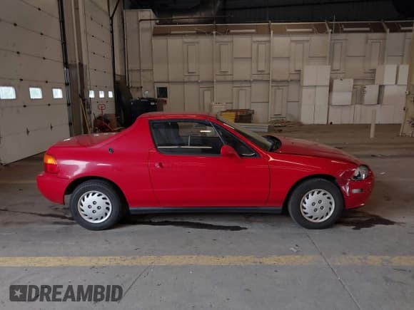✅ 1994 Honda del Sol S • VIN: JHMEG1140RS005031 • Лот: 42261794. Опубликован ранее на IAAI с пробегом 112 498 миль. Бесплатный доступ к архиву аукционных продаж из США и подробный отчёт об истории автомобиля на DreamBid. Изображение 13.