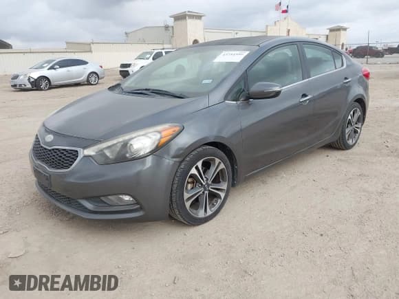 ✅ 2014 Kia Forte EX • VIN: KNAFX4A85E5053883 • Лот: 43754599. Опубликован ранее на IAAI с пробегом 141 937 миль. Бесплатный доступ к архиву аукционных продаж из США и подробный отчёт об истории автомобиля на DreamBid. Изображение 2.