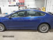 ✅ 2015 Ford Fusion Titanium • VIN: 3FA6P0D99FR128055 • Lot: 42887252. Listed on IAAI with 149,464 mi. Free auction sales archive from the USA and detailed vehicle history report at DreamBid. Image 14.