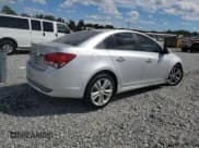 ✅ 2015 Chevrolet Cruze LTZ • VIN: 1G1PG5SB4F7183935 • Lot: 84209825. Listed on Copart with 132,199 mi. Free auction sales archive from the USA and detailed vehicle history report at DreamBid. Image 3.