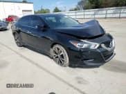 ✅ 2017 Nissan Maxima Platinum • VIN: 1N4AA6AP4HC444174 • Lot: 82112205. Listed on Copart with 100,785 mi. Free auction sales archive from the USA and detailed vehicle history report at DreamBid. Image 13.