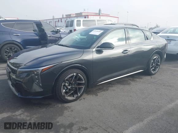 ✅ 2025 Kia K4 GT-Line • VIN: 3KPFW4DE7SE051558 • Lot: 43548484. Listed on IAAI with 5,271 mi. Free auction sales archive from the USA and detailed vehicle history report at DreamBid. Image 2.