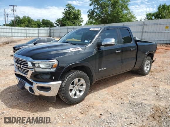 2020 Ram 1500 Laramie with VIN 1C6RREDT0LN265191, listed as a Copart auction lot 57207775 with 124,269 mi miles and Salvage title. Bid and sale history available at DreamBid. Image 1.