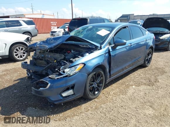 ✅ 2019 Ford Fusion SE • VIN: 3FA6P0HD9KR231582 • Лот: 43257640. Опубликован ранее на IAAI с пробегом 84 431 миль. Бесплатный доступ к архиву аукционных продаж из США и подробный отчёт об истории автомобиля на DreamBid. Изображение 2.
