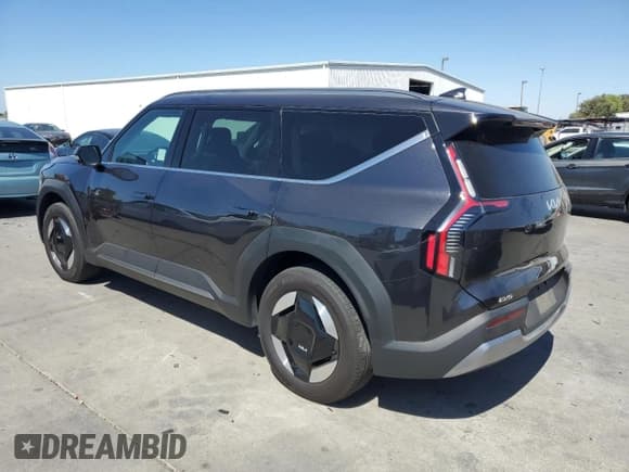 ✅ 2024 Kia EV9 Wind • VIN: KNDAFFS54R6038145 • Lot: 65279865. Listed on Copart with 28,864 mi. Free auction sales archive from the USA and detailed vehicle history report at DreamBid. Image 2.