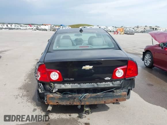 2012 Chevrolet Malibu 1LS z VIN 1G1ZB5E03CF253296, wystawiony jako IAAI lot #43278369 z przebiegiem 144 163 mil mil oraz . Historia ofert i sprzedaży dostępna na DreamBid. Obrazek 16.