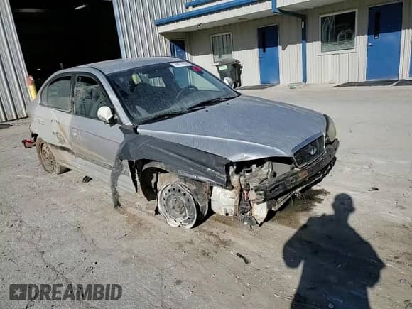 2002 Hyundai Elantra GLS z VIN KMHDN45D62U305242, wystawiony jako Copart lot #74677914 z przebiegiem 151 933 mil mil oraz Szkoda całkowita • Salvage title. Historia ofert i sprzedaży dostępna na DreamBid. Obrazek 10.