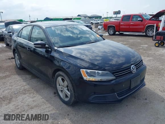 ✅ 2014 Volkswagen Jetta TDI w/Premium/Nav • VIN: 3VWLL7AJ2EM415312 • Lot: 42123936. Listed on IAAI with 47,874 mi. Free auction sales archive from the USA and detailed vehicle history report at DreamBid. Image 1.