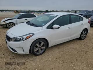 ✅ 2018 Kia Forte LX • VIN: 3KPFL4A76JE206100 • Lot: 94161745. Listed on Copart with 150,033 mi. Free auction sales archive from the USA and detailed vehicle history report at DreamBid. Image 1.