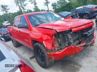 ✅ 2018 Chevrolet Silverado 1500 Custom • VIN: 3GCPCPECXJG604511 • Lot: 42300823. Wystawiony na IAAI z przebiegiem 131 808 mil. Bezpłatny archiwum sprzedaży aukcyjnych z USA i szczegółowy raport historii pojazdu na DreamBid. Zdjęcie 1.