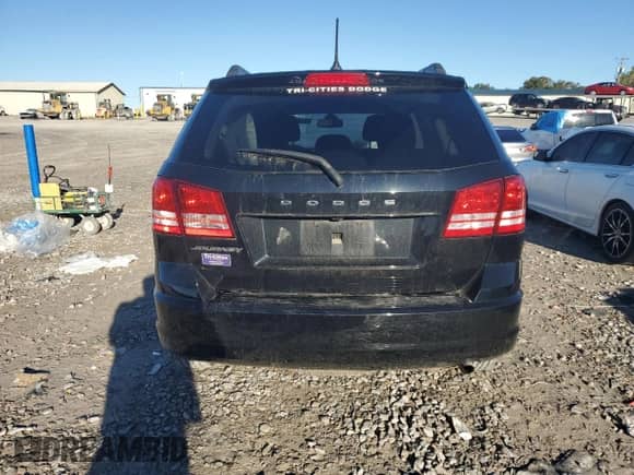 2018 Dodge Journey SE with VIN 3C4PDCAB0JT427879, listed as a Copart auction lot 82583695 with 80,549 mi miles and Salvage title. Bid and sale history available at DreamBid. Image 6.
