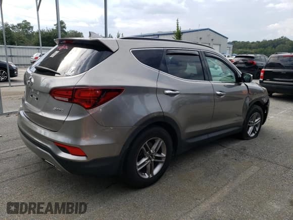 ✅ 2018 Hyundai Santa Fe 2.4L • VIN: 5NMZU3LB2JH069171 • Лот: 67220323. Опубликован ранее на Copart с пробегом 41 400 миль. Бесплатный доступ к архиву аукционных продаж из США и подробный отчёт об истории автомобиля на DreamBid. Изображение 3.