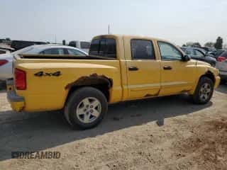 2006 Dodge Dakota SLT с VIN 1D7HW48N86S679222, выставлен на аукционе Copart как лот 71169894 с пробегом 115 545 миль миль и Списание • Salvage title. История ставок и продаж доступна на DreamBid. Изображение 3.