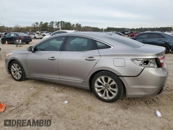 2012 Hyundai Azera с VIN KMHFG4JG7CA185540, выставлен на аукционе Copart как лот 88073395 с пробегом 177 746 миль миль и Списание • Salvage title. История ставок и продаж доступна на DreamBid. Изображение 2.