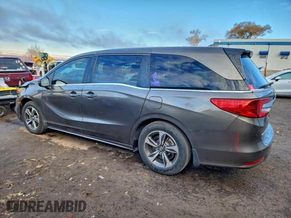 ✅ 2018 Honda Odyssey Touring • VIN: 5FNRL6H84JB005622 • Lot: 94671885. Wystawiony na Copart z przebiegiem 87 429 mil. Bezpłatny archiwum sprzedaży aukcyjnych z USA i szczegółowy raport historii pojazdu na DreamBid. Zdjęcie 2.